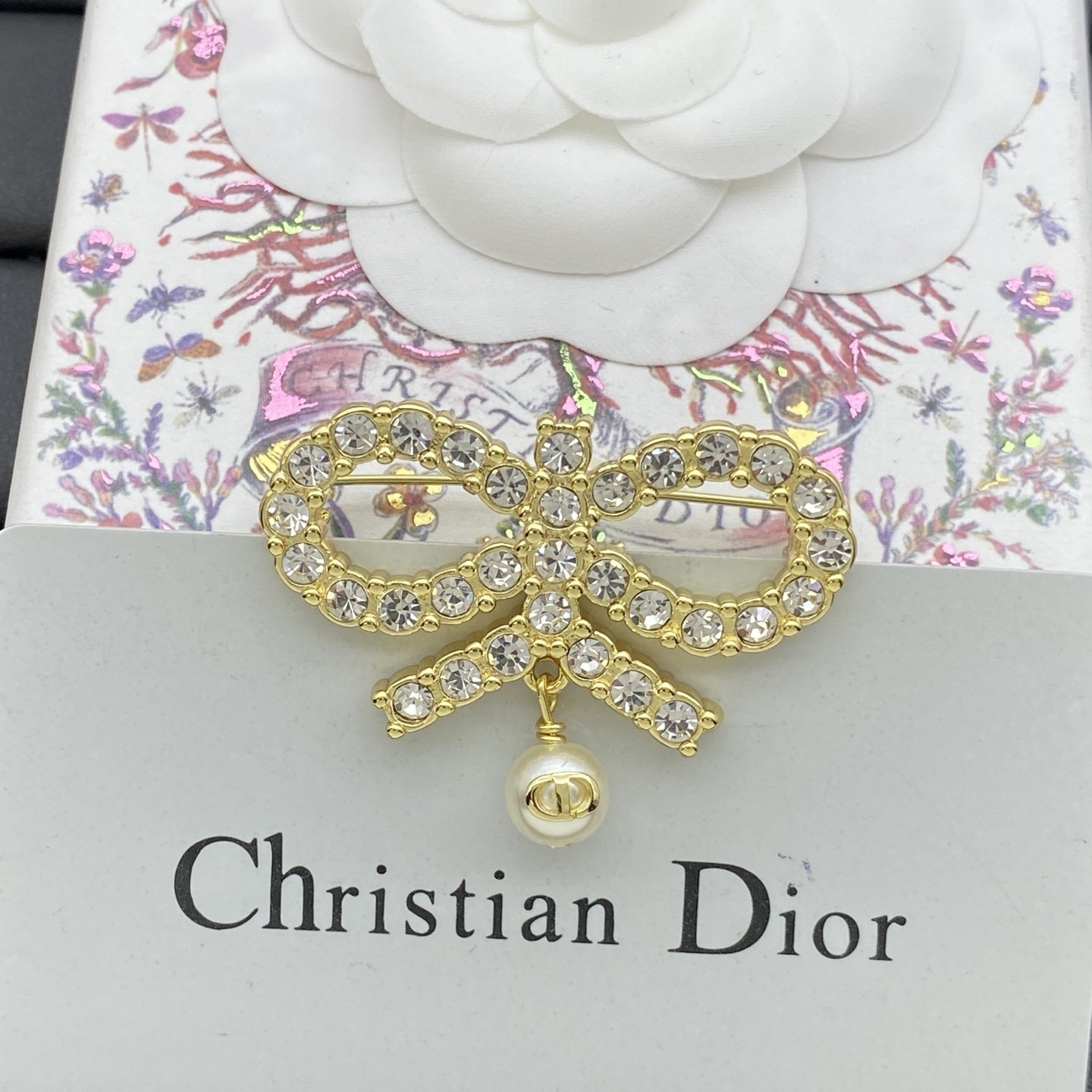 Dior Crystal bow tie pearl brooch 45*30mm
