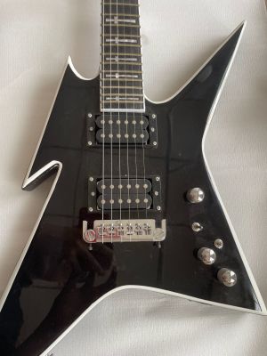 Custom Shaped BC Electric Guitar With Black Body And Silver Hemming